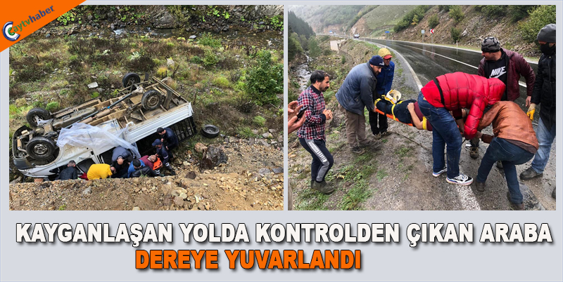 KAYGANLAŞAN YOLDA KONTROLDEN ÇIKAN ARABA DEREYE YUVARLANDI