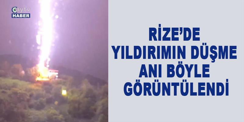 RİZE'DE KUVVETLİ YAĞIŞLARLA BERABER BİR EVİN YAKININA YILDIRIMIN DÜŞME ANI CEP TELEFONUYLA KAYDEDİLDİ