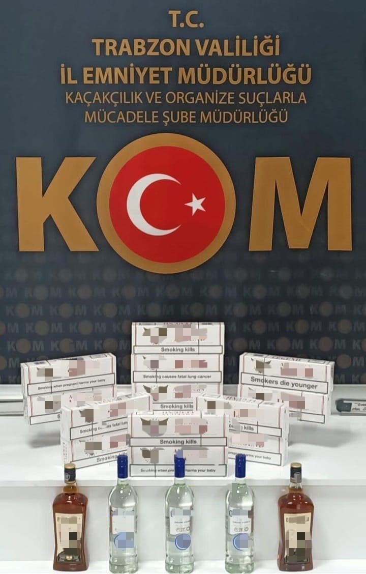 TRABZON'DA POLİS EKİPLERİ YAPILAN ARAMADA 53 KİLOGRAM AÇIK VE KAPALI PAKETLER HALİNDE KIYILMIŞ TÜTÜN, 430 KUTU BANDROLSÜZ BOŞ MAKARON, 200 KUTU BANDROLSÜZ DOLU MAKARON VE 1 ADET SİGARA SARMA MAKİNESİ ELE GEÇİRİLDİ